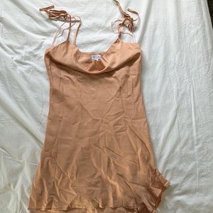 Brand new. Didn’t come with tags. Ordered online through These Three Boutique